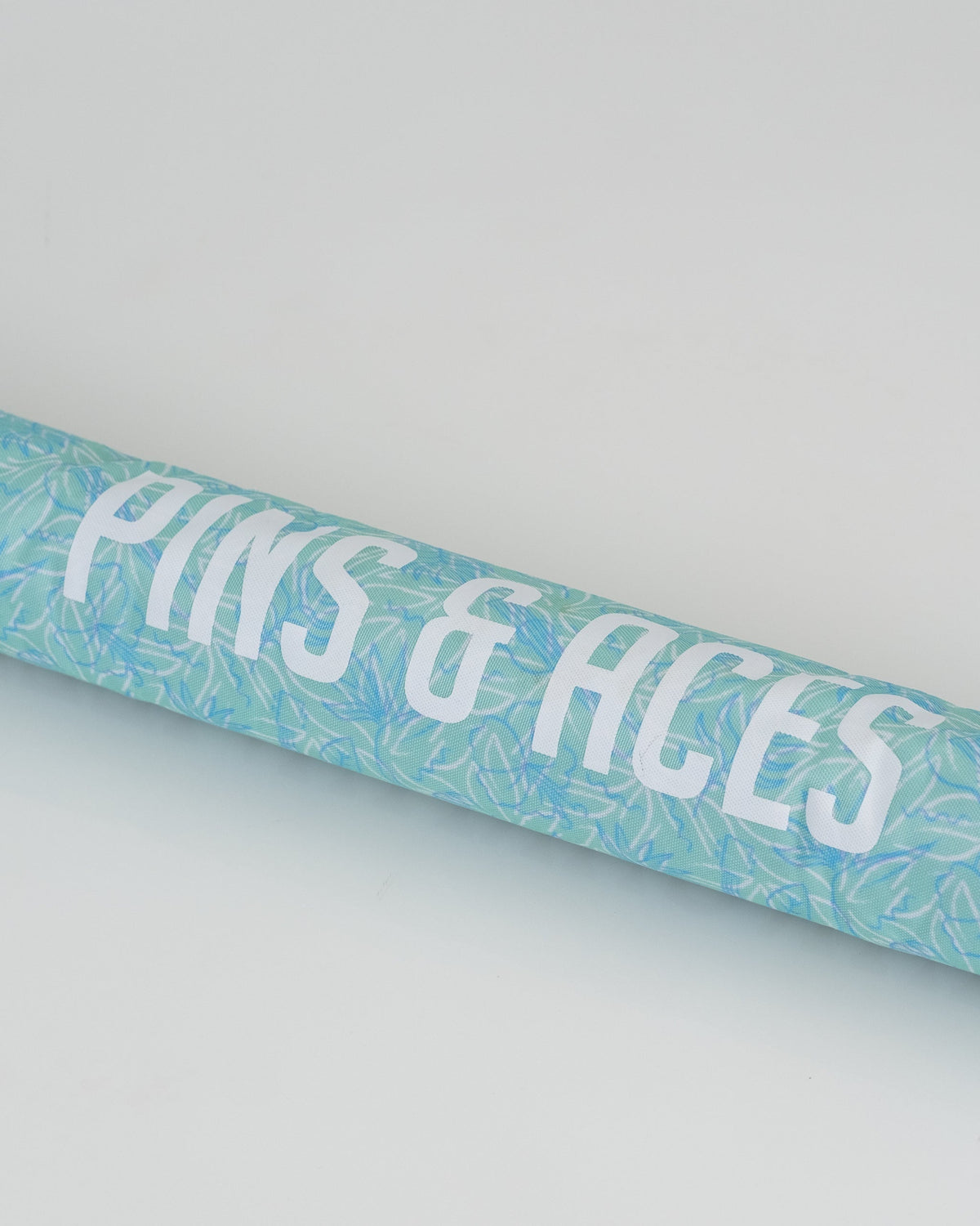 Margaritaville beer sleeve featuring a vibrant tropical design, ideal for keeping beverages cold.