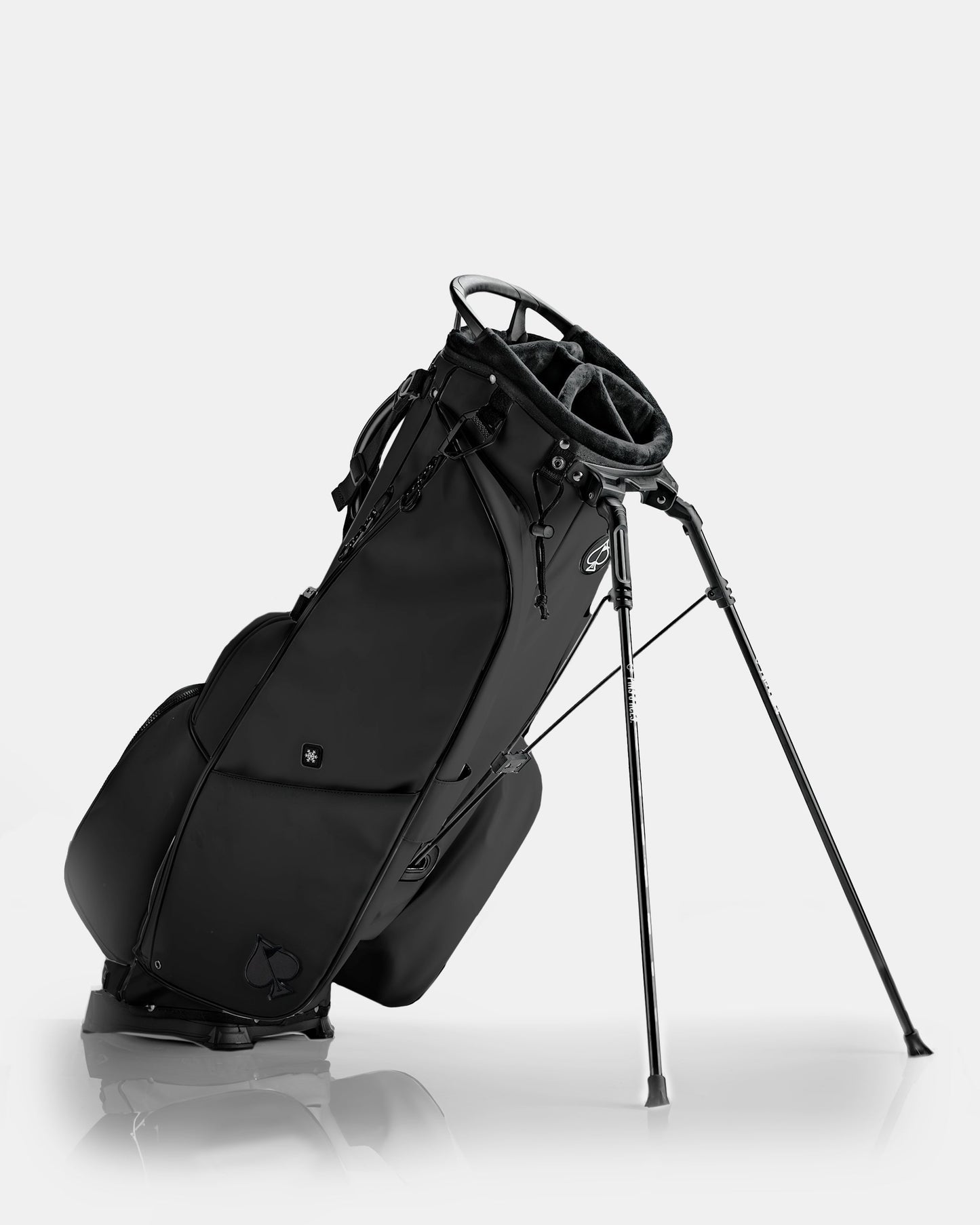Sleek black Player Preferred Golf Bag with a stand, featuring multiple pockets and a stylish design for golfers.