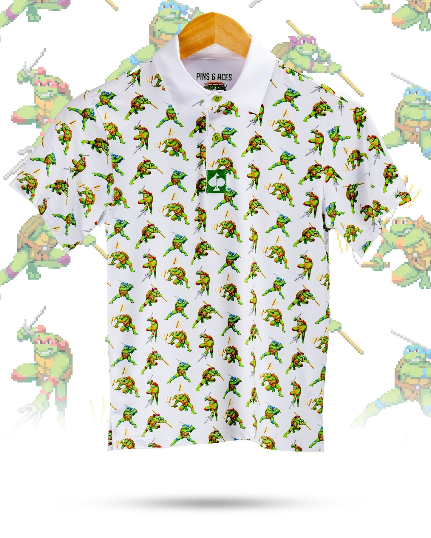 Youth polo shirt featuring a vibrant all-over print of Teenage Mutant Ninja Turtles in a classic 8-bit style.