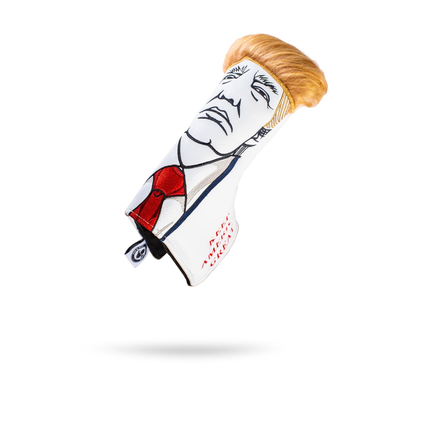 Bold Trump-themed blade putter cover featuring a cartoonish design with a distinctive hairstyle and suit details.