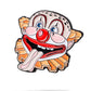 Colorful clown mouth ball marker for golf, featuring a playful design with vibrant colors.