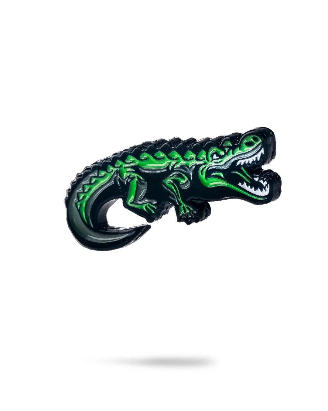 Crocodile-shaped ball marker for golf, featuring intricate detailing and a polished finish.