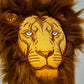 Lion driver cover featuring realistic detailing with a vibrant lion face design, crafted to fit standard golf clubs.