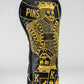Black and gold King of Spades driver cover with intricate design, featuring a spade emblem prominently displayed.