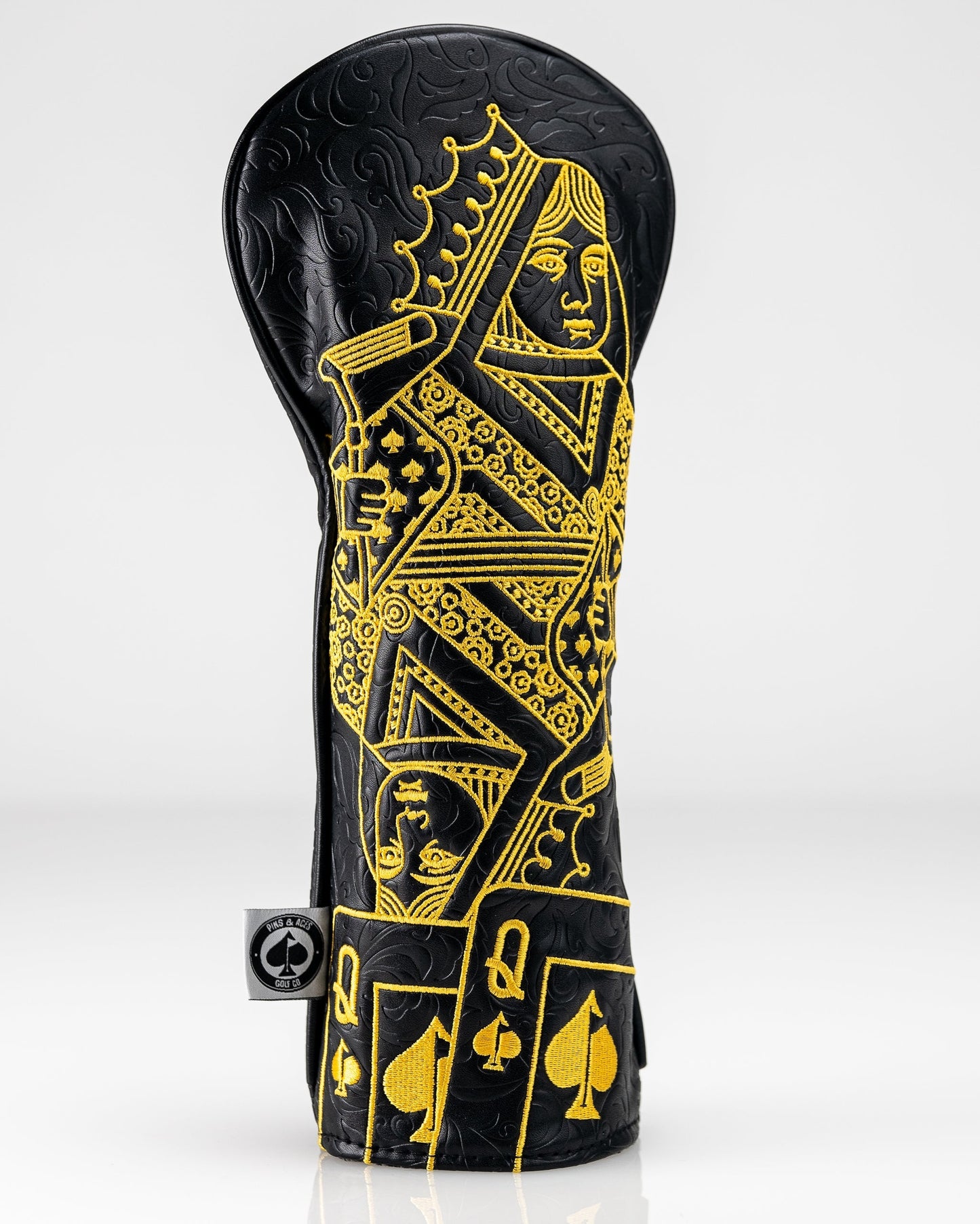 Black and gold queen of spades fairway cover for golf clubs.