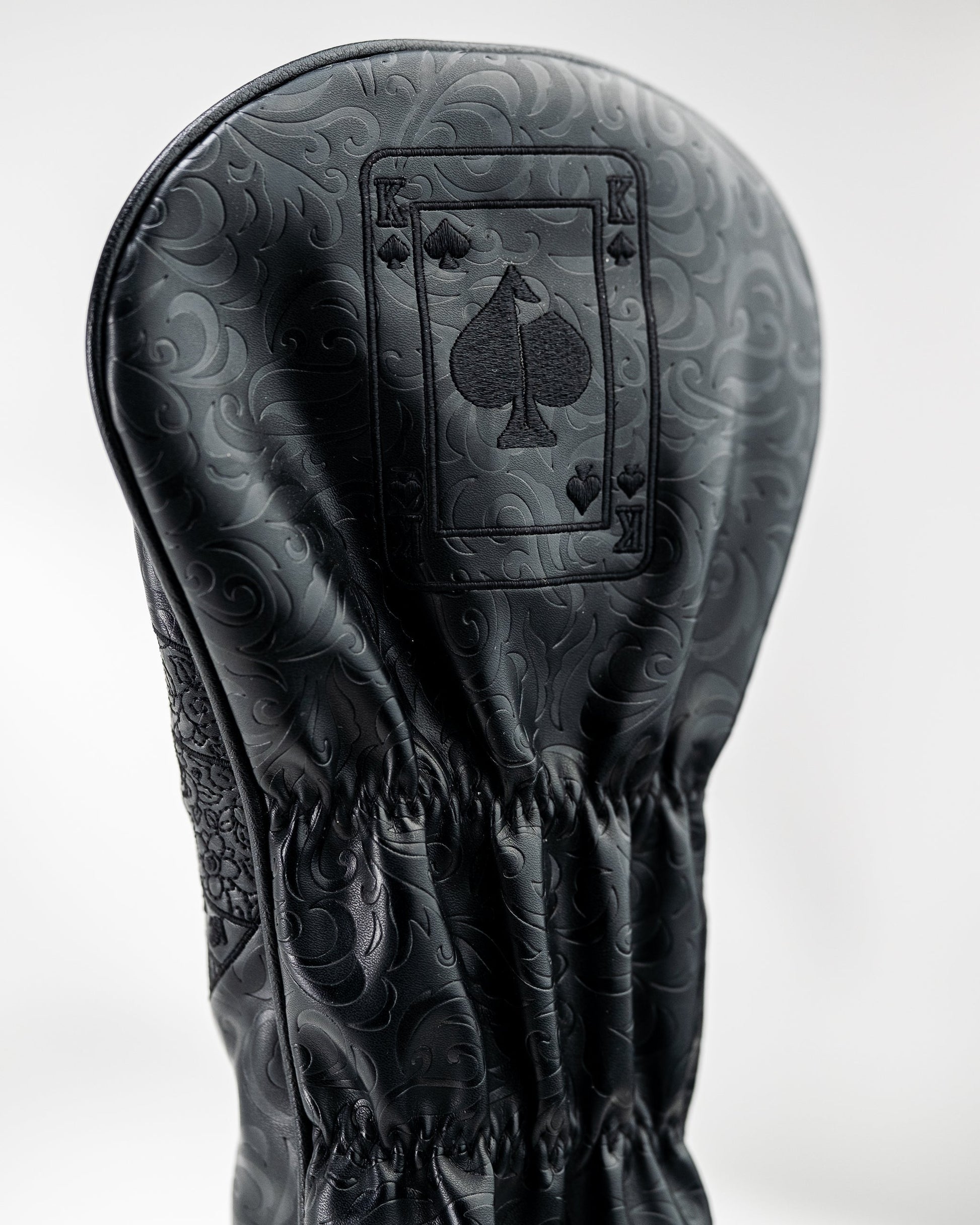 Blackout King of Spades driver cover featuring a sleek design with a black finish and gold accents.