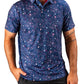 Men's blue splatter golf polo featuring a vibrant, colorful design, perfect for making a bold statement on the course.