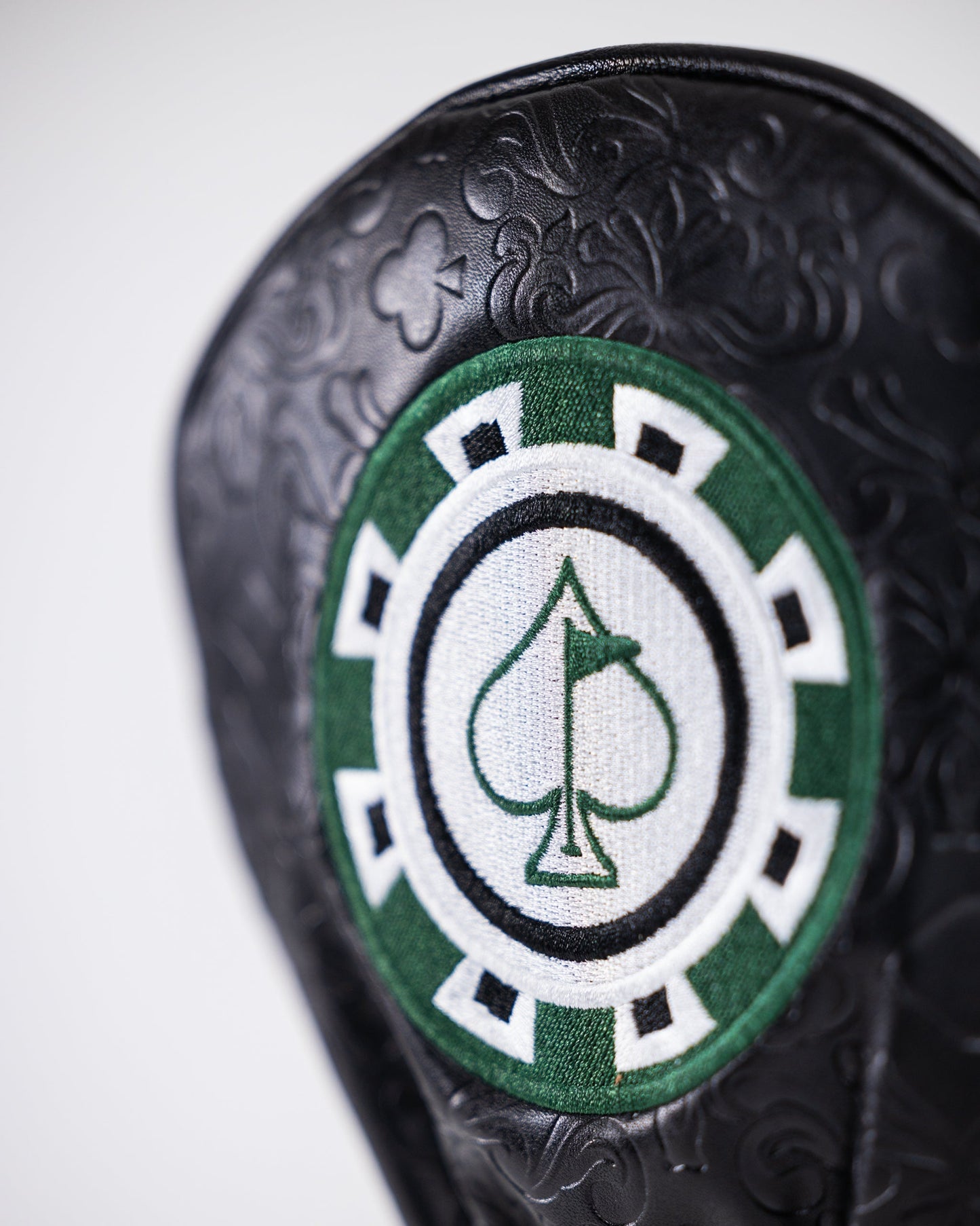 Blackjack-themed driver cover featuring a casino design with playing cards and chips on a dark background.