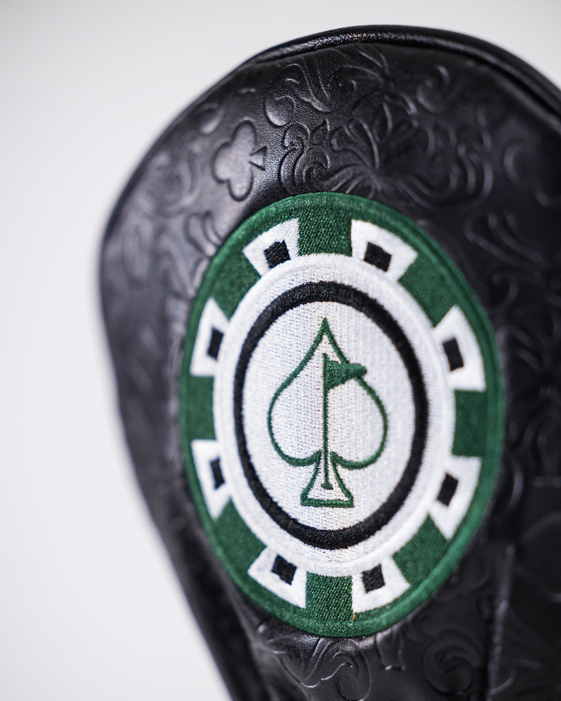 Blackjack-themed driver cover featuring a casino design with playing cards and chips on a dark background.