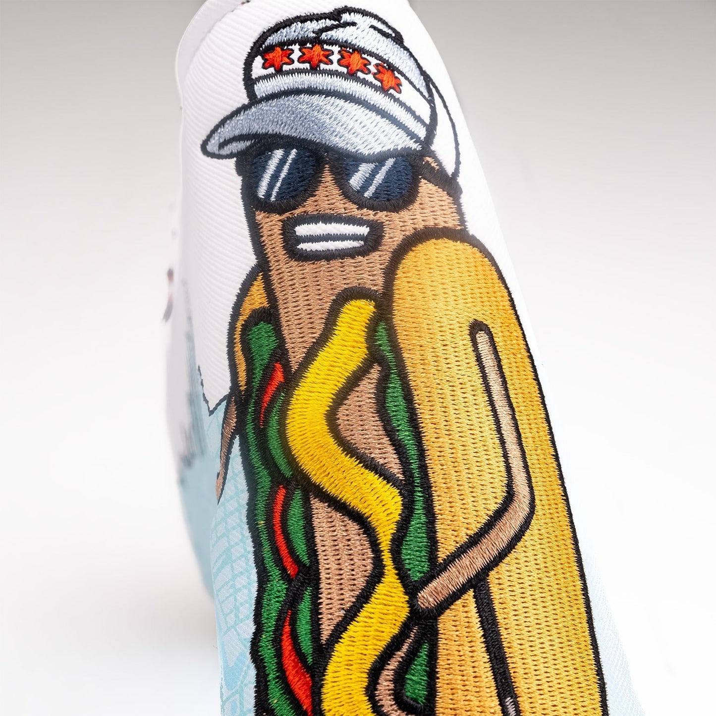 Chicago Dog Blade Putter Cover featuring a playful dog design, made to protect putters while adding a fun style to golf gear.