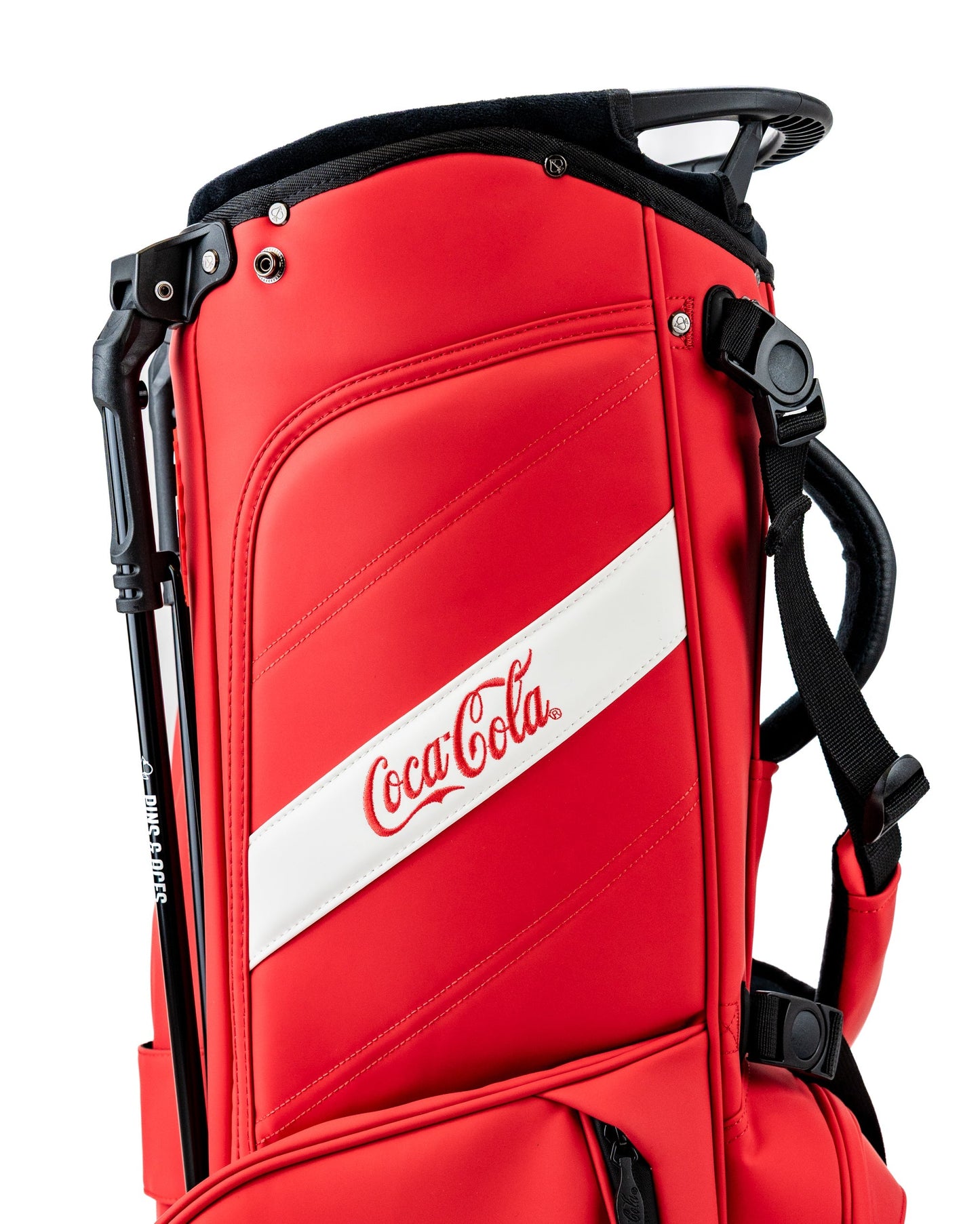 Bold red golf bag featuring Coca-Cola branding, designed for style and functionality on the course.
