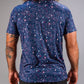 Men's blue splatter golf shirt featuring a vibrant, colorful pattern, perfect for making a statement on the course.