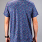 Men's short-sleeve golf shirt featuring a vibrant lavender floral pattern on a dark background, ideal for stylish play.