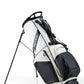 Player Preferred™ Golf Bag in Domino design, featuring a sleek black and white pattern, multiple pockets, and a padded shoulder strap, suitable for golfers.