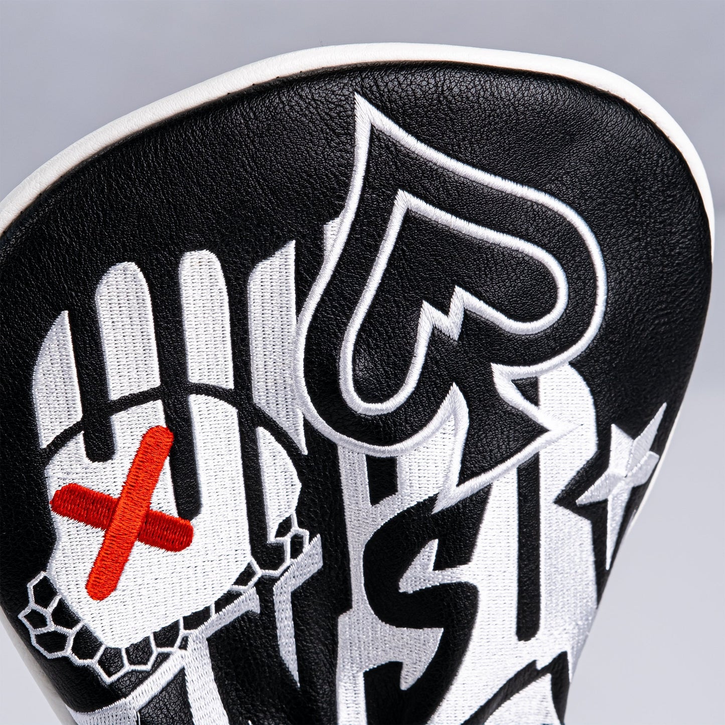 Graffiti-patterned driver cover with vibrant colors and a modern design.