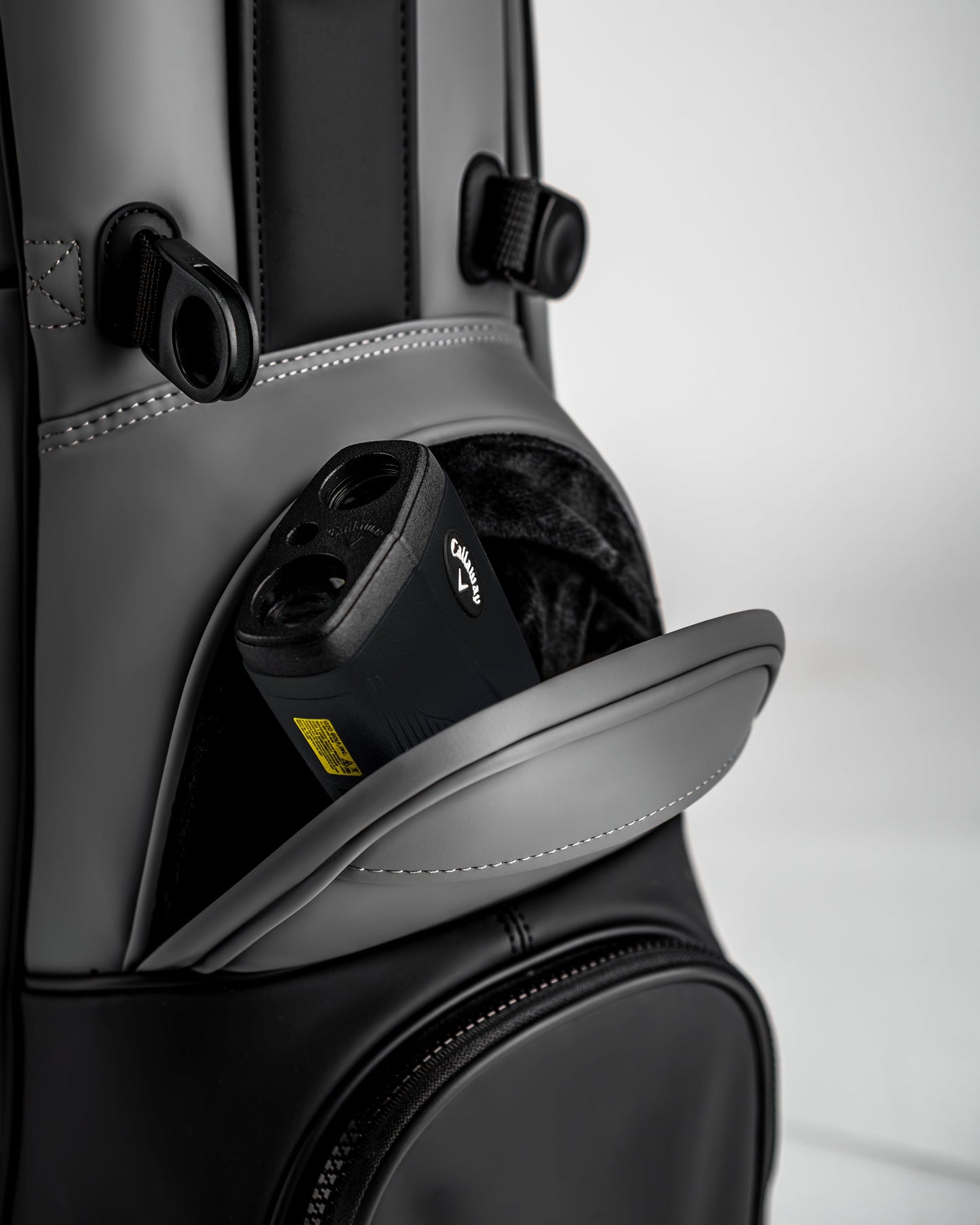 Player Preferred™ Golf Bag in Flat Ash color, showcasing a sleek design with multiple pockets and a comfortable strap, ideal for carrying golf essentials.