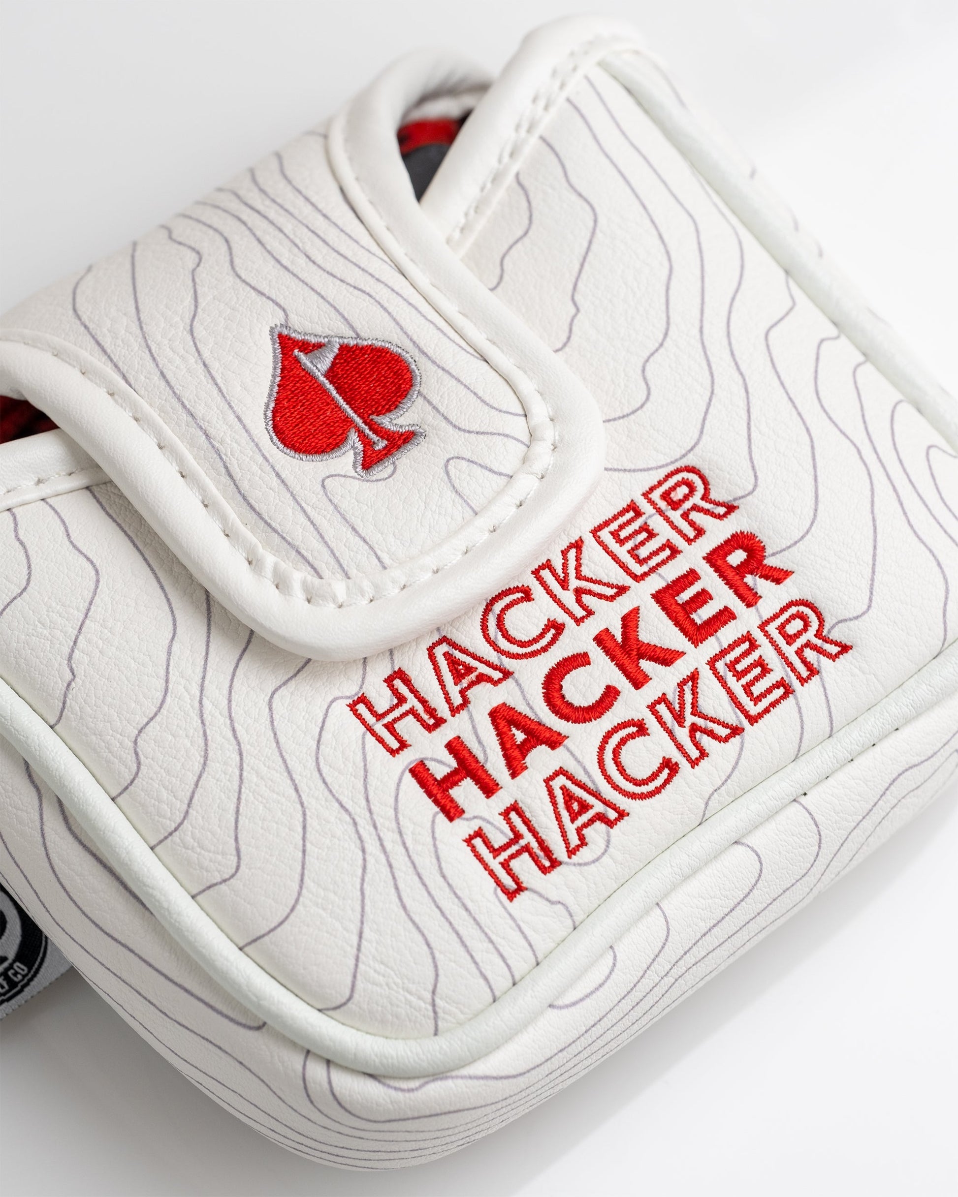 Hacker Mallet Cover featuring a sleek black design with an embroidered logo, designed to protect golf mallets.