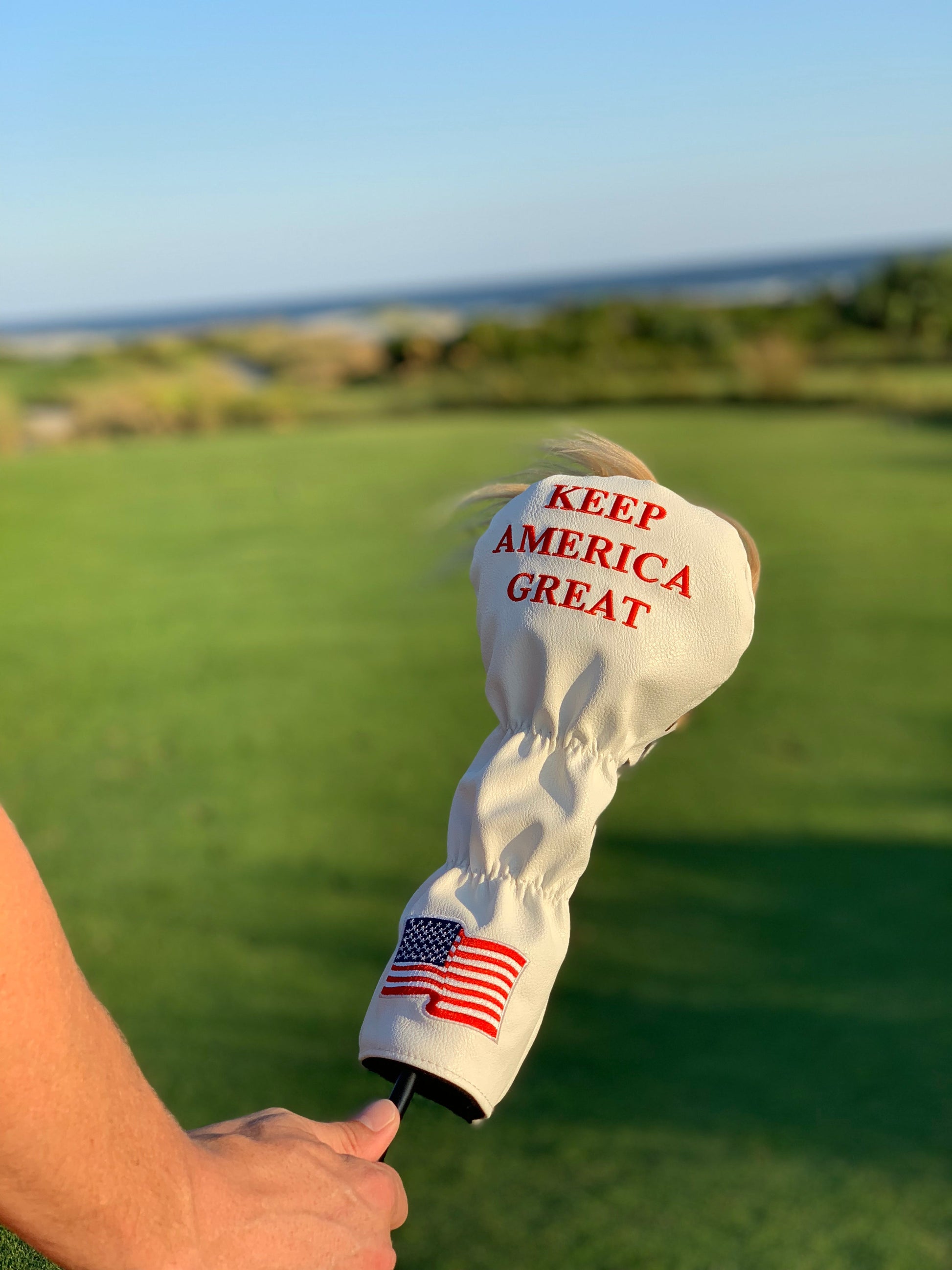 Trump Fairway Cover featuring a sleek design in rich colors, ideal for protecting golf clubs while showcasing a unique presidential theme.