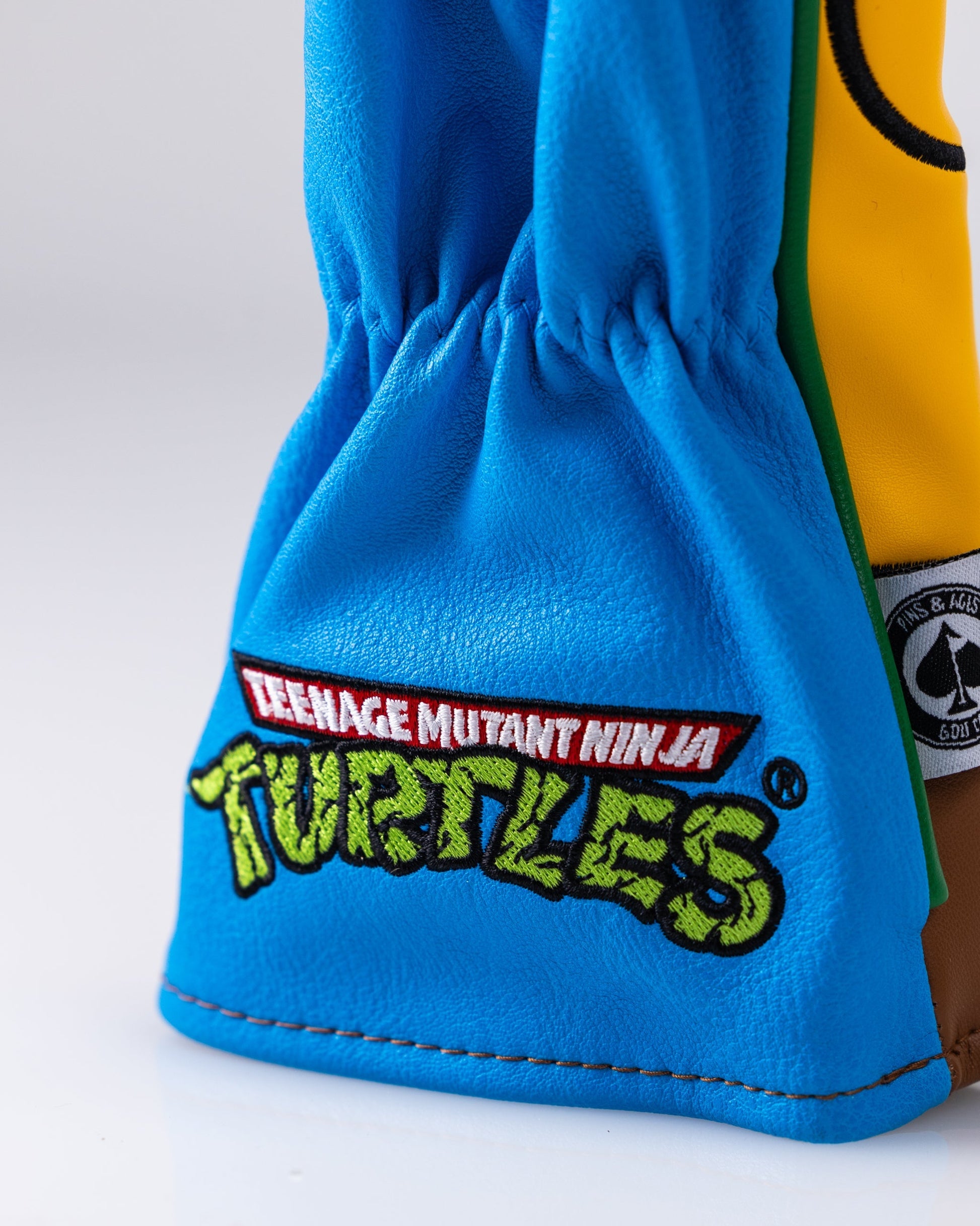 TMNT Leonardo Fairway Cover featuring a vibrant blue and green design with Leonardo's signature mask and sword details.