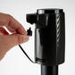 LiquorStick® 3.0 in black, featuring a sleek design and plug for easy use.