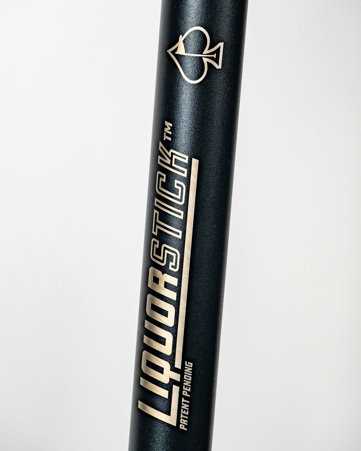 LiquorStick® 3.0 in black, featuring a sleek design ideal for easily dispensing various liquors.