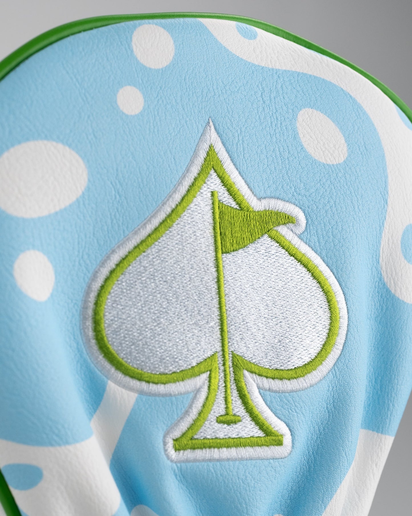Margaritaville golf driver cover featuring a tropical design with vibrant colors and a distinct logo, designed to protect golf clubs.