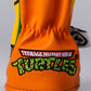 TMNT Michelangelo hybrid cover featuring vibrant artwork of the character with a dynamic pose and iconic orange bandana.