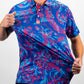 Cabo Colada retro polo shirt in vibrant colors against a white background.