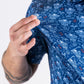"NASA Space Walker blue polo shirt featuring the NASA logo and astronaut graphic."