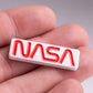 NASA "Worm" Ball Marker featuring a bold red and blue design with the iconic NASA logo.