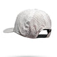 Perforated rope hat in Mourning Wood and Bone colors, featuring a curved brim and adjustable strap.