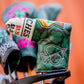 Augusta '25 Blade Putter Cover in vibrant green with logo, designed for golf enthusiasts.