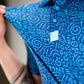 Bold blue polo shirt featuring a playful doodle pattern inspired by TMNT, showcasing unique style for golfers.