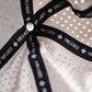Interior view of a perforated bone-colored rope hat featuring a black Pins & Aces label and breathable design.