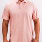 Men's Player Preferred Polo in Coral Palms features a vibrant coral color with a subtle palm pattern, ideal for stylish golf outings.