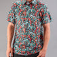 Bold teal golf shirt featuring a vibrant tiger and floral pattern, designed for golfers who want to stand out on the course.