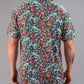 Bold teal golf shirt featuring a vibrant tiger and floral pattern, designed for golfers who want to stand out on the course.