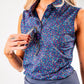 Women's Lavender Flower Power golf shirt featuring a vibrant floral pattern, perfect for stylish play on the course.
