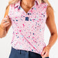 Women's pink sleeveless polo shirt featuring a vibrant splatter design in various colors, perfect for stylish golf outings.