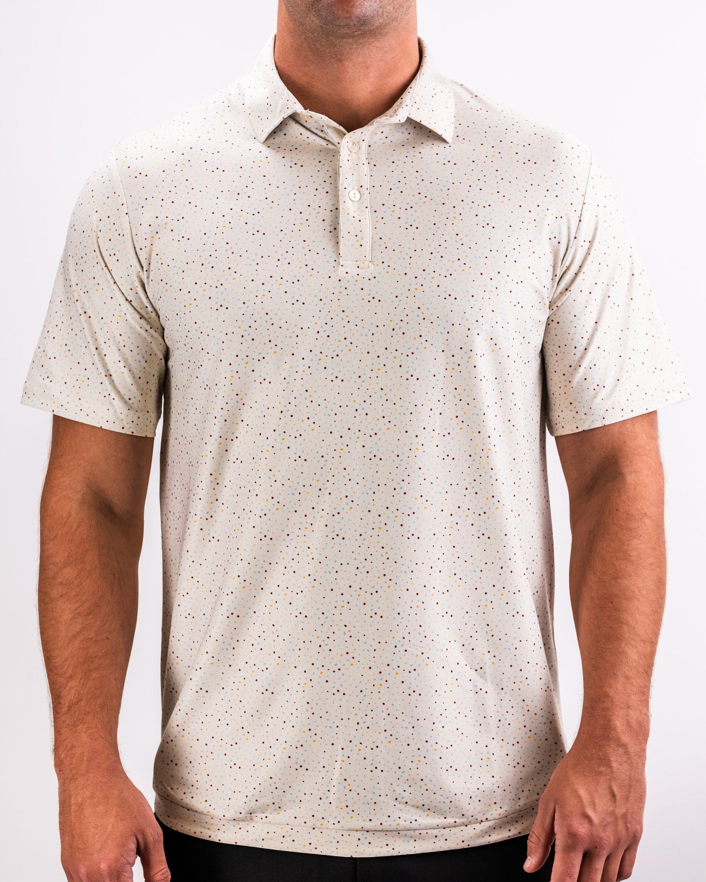 Player Preferred™ Polo in Terrazzo design featuring a modern, textured pattern in muted colors, suitable for casual or athletic wear.