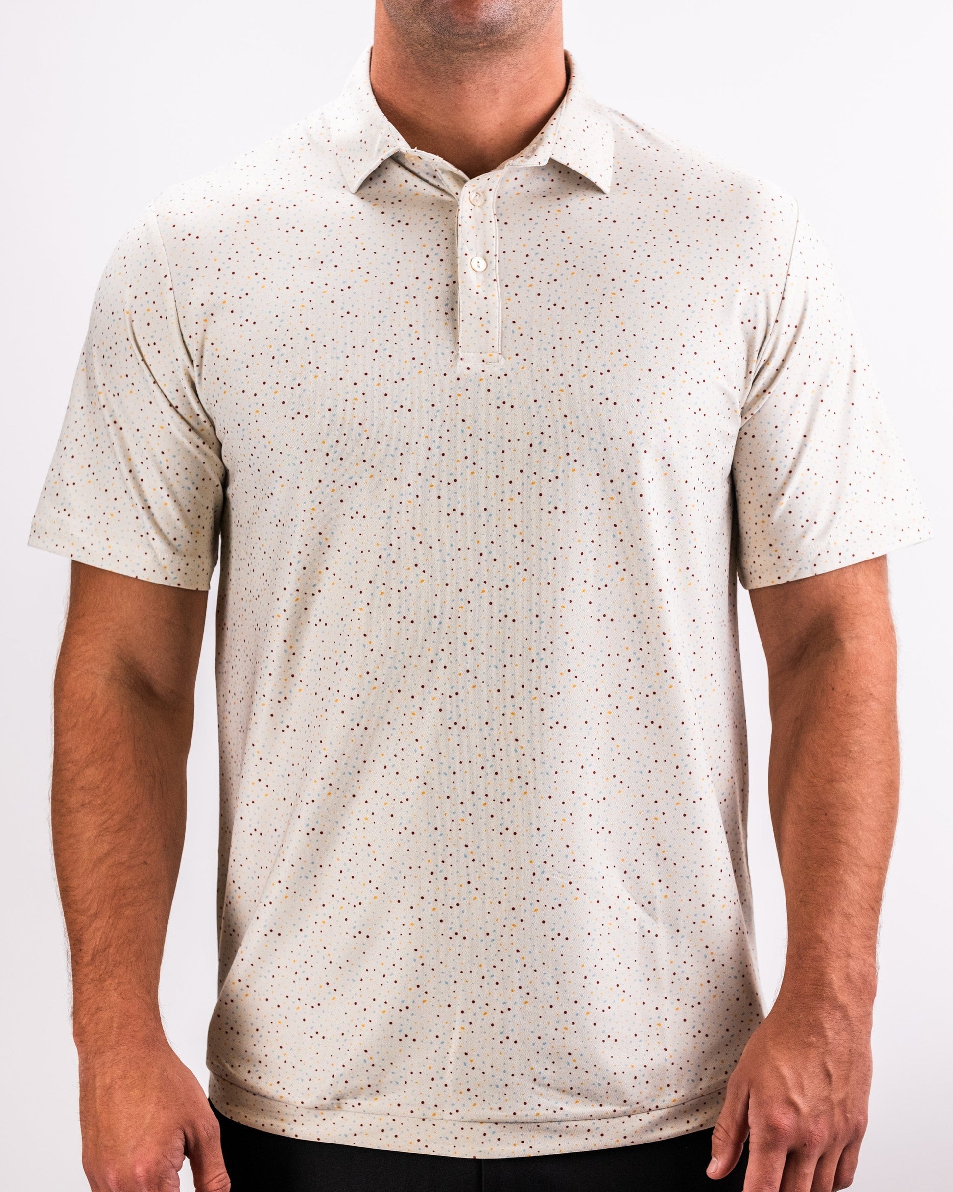Player Preferred™ Polo in Terrazzo design featuring a modern, textured pattern in muted colors, suitable for casual or athletic wear.