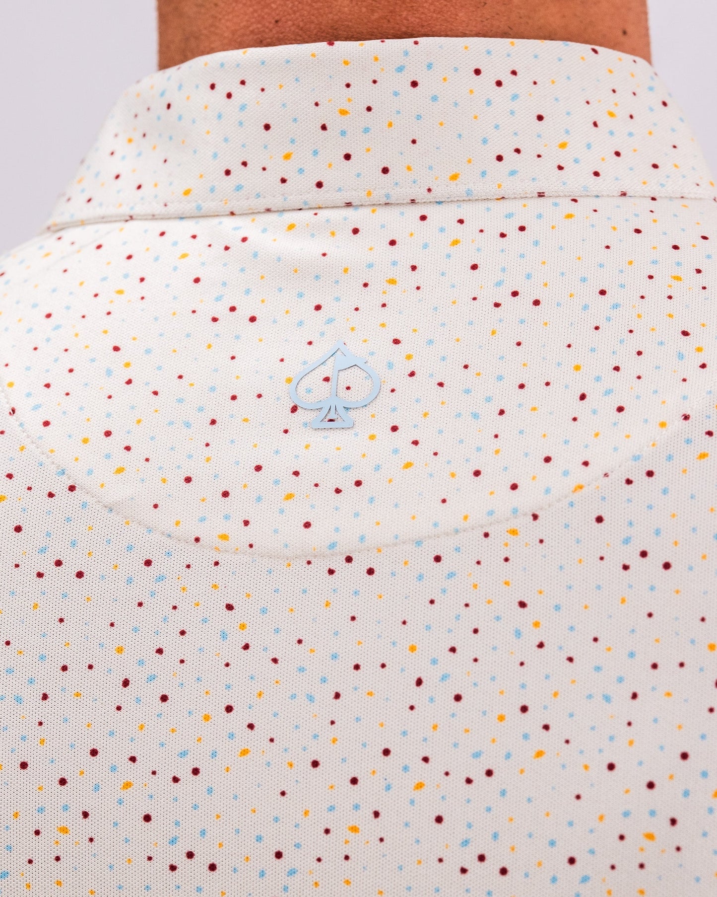 Men's Player Preferred™ Polo in Terrazzo pattern, featuring a modern design and a stylish collar.
