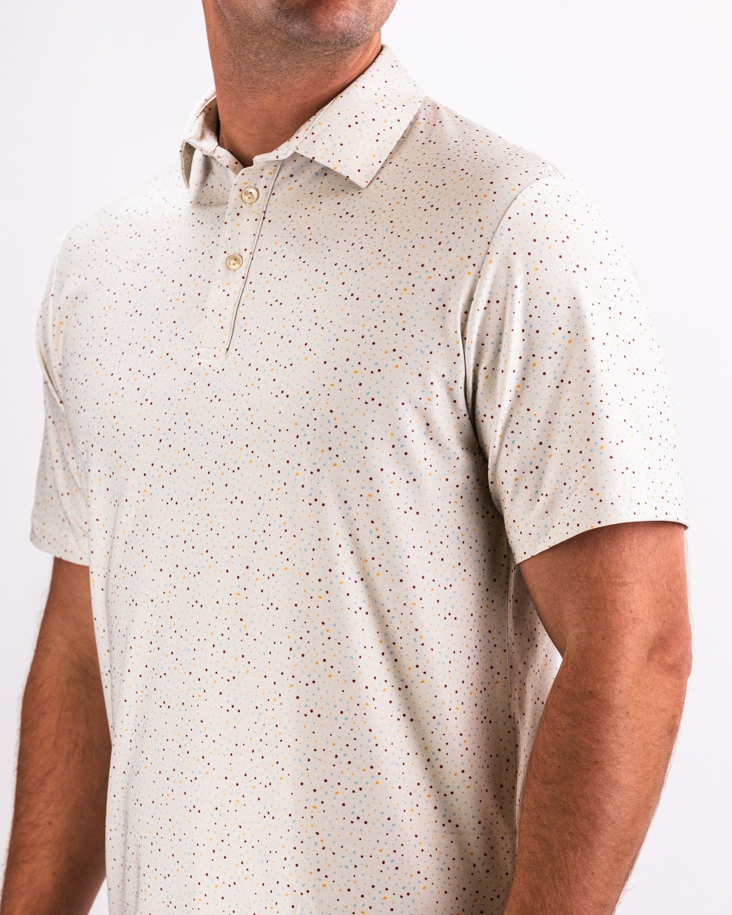 Player Preferred™ Polo in Terrazzo pattern, showcasing a stylish design with vibrant colors, short sleeves, and a classic collar.