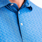 Player Preferred™ Polo in Cosmic Swirl design, featuring a vibrant multicolor pattern, short sleeves, and a classic collar.