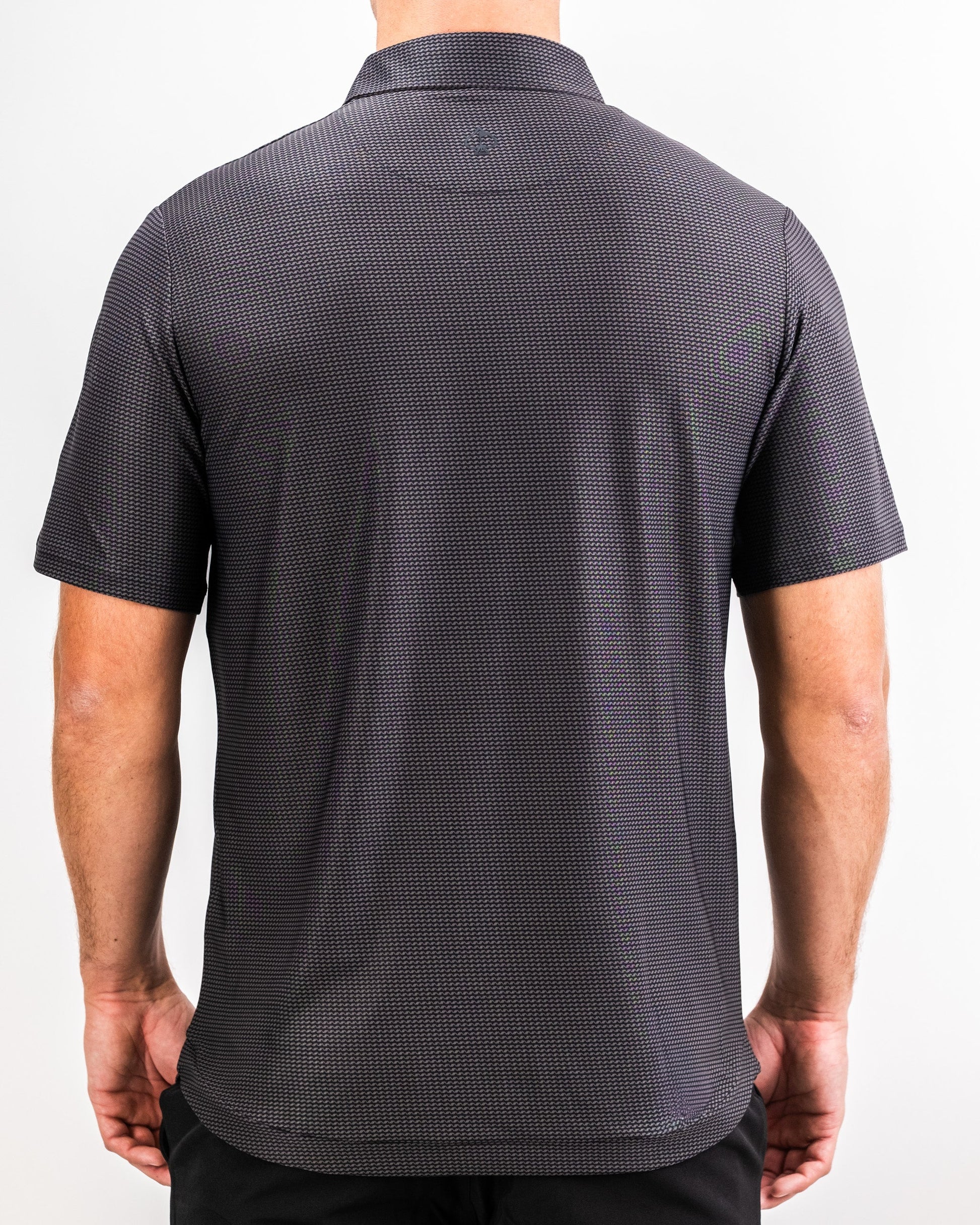 Player Preferred™ Polo in Night Wave, featuring a sleek design with a dark blue color and subtle texture, styled on a mannequin against a neutral background.