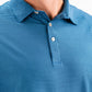 Close-up of a blue Player Preferred™ Polo shirt with a wave-like pattern, featuring a collar and white buttons.