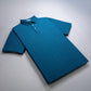 Blue Player Preferred™ Polo shirt with a small floral pattern, short sleeves, and a collar, laid flat on a white surface.