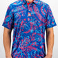 Cabo Colada men's polo shirt in vibrant turquoise with short sleeves, modeled outdoors.