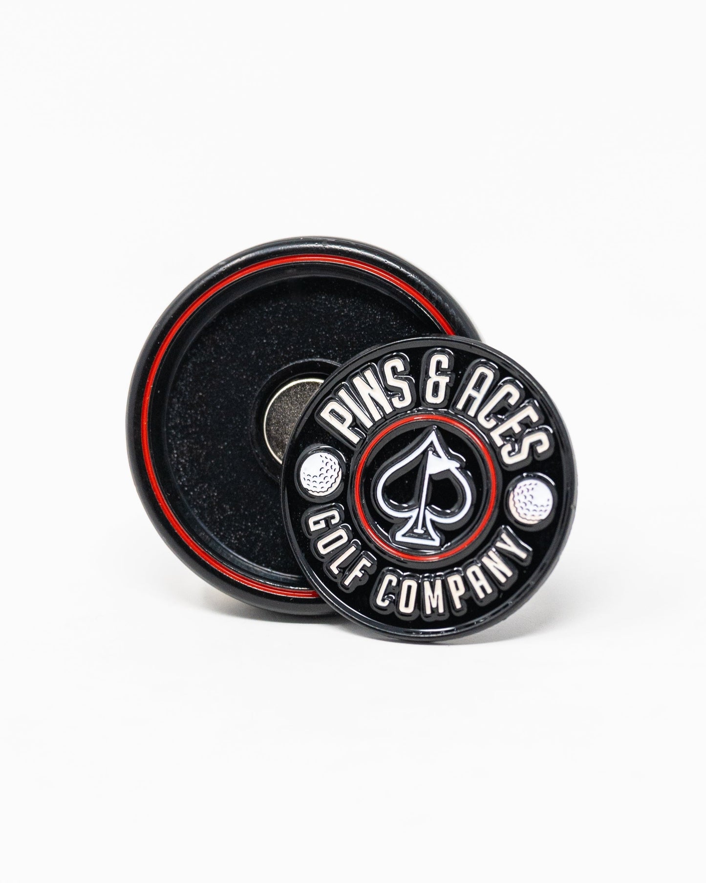 Black Pop Out Medallion Ball Marker featuring a sleek design.