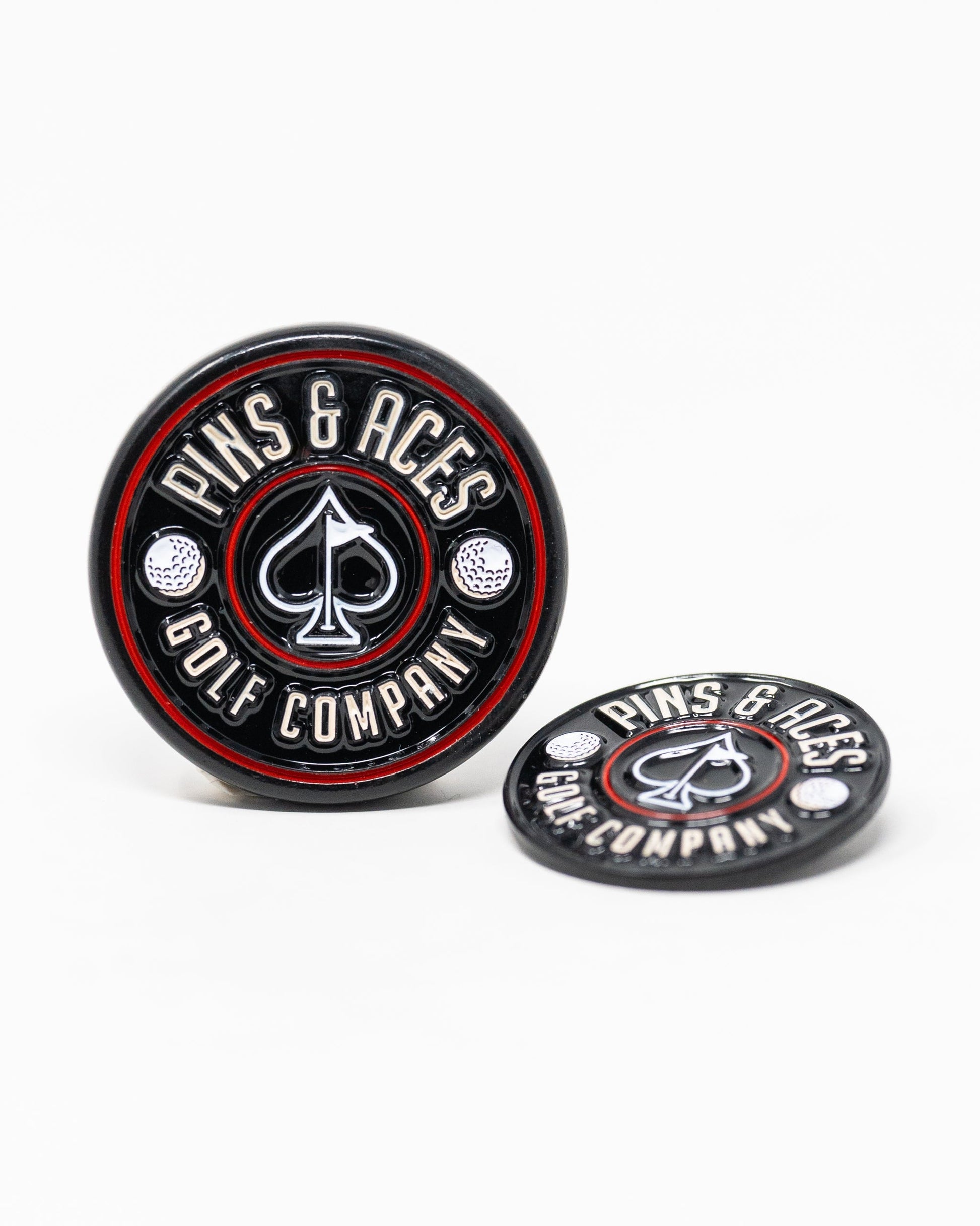 Pop Out Medallion Ball Marker in Black, featuring a sleek design and easy-to-use pop-out mechanism for golfers.